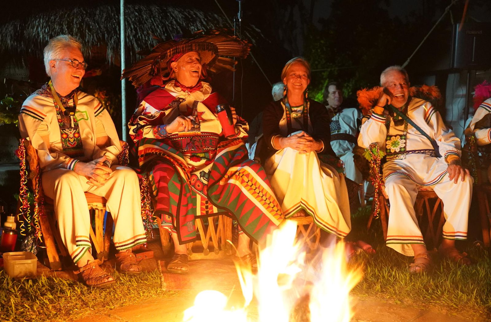 Grupo Tatewarí members gathered around a ceremonial fire